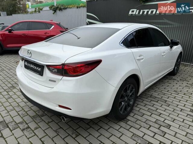Білий Мазда 6, об'ємом двигуна 2 л та пробігом 145 тис. км за 12900 $, фото 37 на Automoto.ua