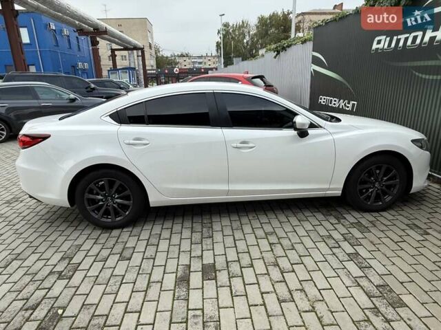 Білий Мазда 6, об'ємом двигуна 2 л та пробігом 145 тис. км за 12900 $, фото 38 на Automoto.ua