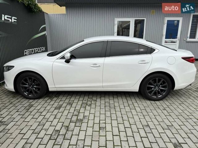 Білий Мазда 6, об'ємом двигуна 2 л та пробігом 145 тис. км за 12900 $, фото 30 на Automoto.ua