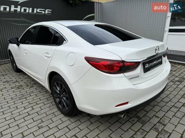 Білий Мазда 6, об'ємом двигуна 2 л та пробігом 145 тис. км за 12900 $, фото 35 на Automoto.ua