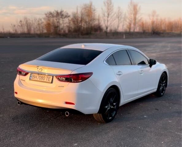 Белый Мазда 6, объемом двигателя 2.5 л и пробегом 200 тыс. км за 10900 $, фото 3 на Automoto.ua