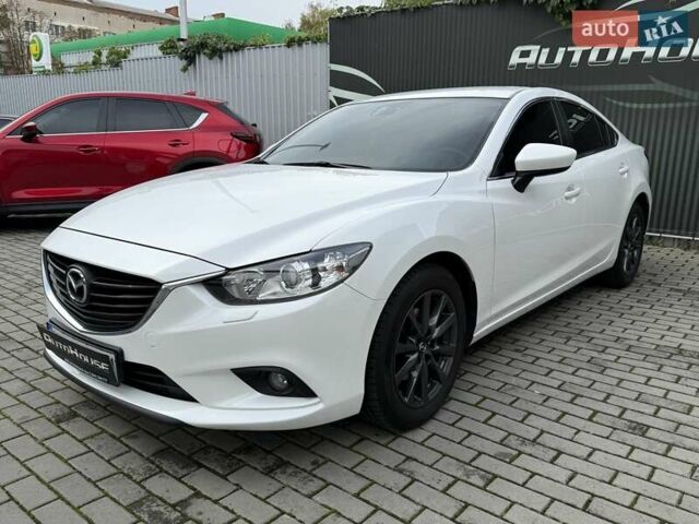 Білий Мазда 6, об'ємом двигуна 2 л та пробігом 145 тис. км за 12900 $, фото 15 на Automoto.ua