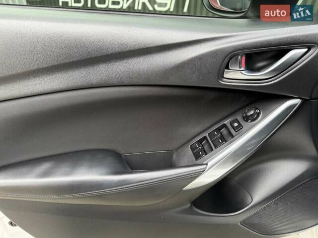 Білий Мазда 6, об'ємом двигуна 2 л та пробігом 145 тис. км за 12900 $, фото 57 на Automoto.ua