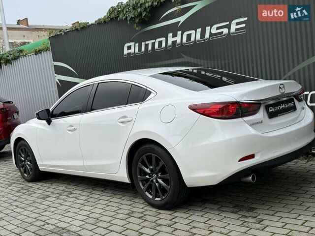 Білий Мазда 6, об'ємом двигуна 2 л та пробігом 145 тис. км за 12900 $, фото 21 на Automoto.ua