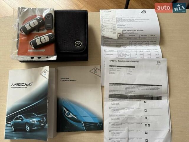 Білий Мазда 6, об'ємом двигуна 2 л та пробігом 145 тис. км за 12900 $, фото 74 на Automoto.ua