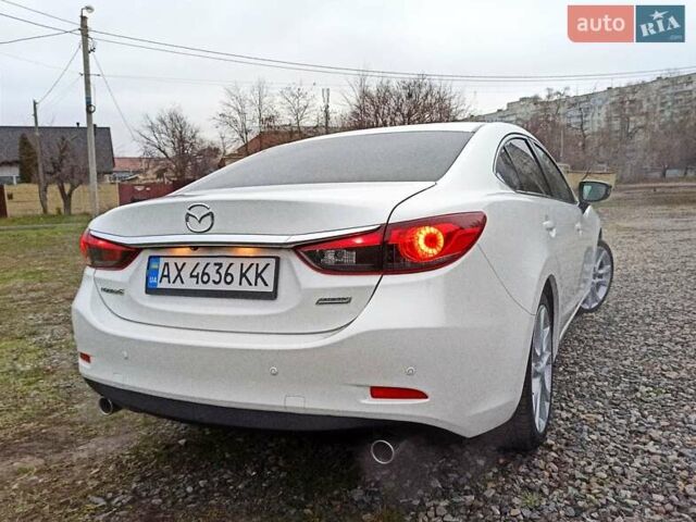 Белый Мазда 6, объемом двигателя 2.49 л и пробегом 166 тыс. км за 12500 $, фото 5 на Automoto.ua