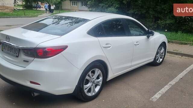 Білий Мазда 6, об'ємом двигуна 2 л та пробігом 112 тис. км за 12300 $, фото 7 на Automoto.ua