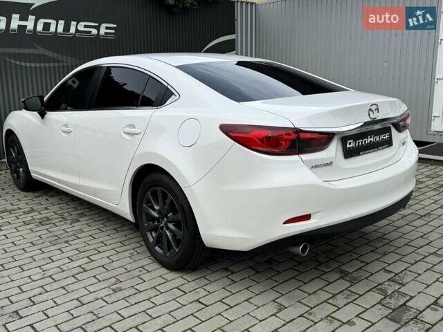 Білий Мазда 6, об'ємом двигуна 2 л та пробігом 145 тис. км за 12900 $, фото 32 на Automoto.ua