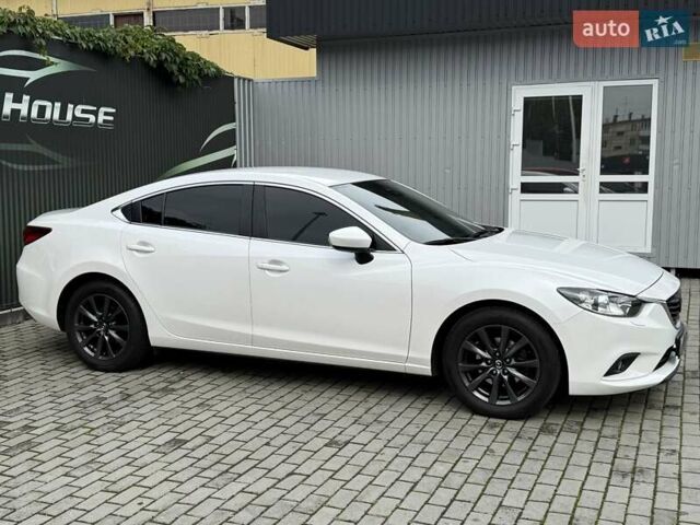 Білий Мазда 6, об'ємом двигуна 2 л та пробігом 145 тис. км за 12900 $, фото 14 на Automoto.ua