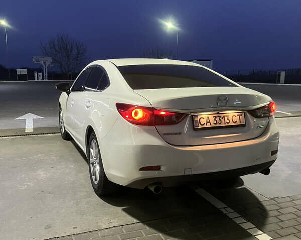 Белый Мазда 6, объемом двигателя 2.49 л и пробегом 161 тыс. км за 11450 $, фото 1 на Automoto.ua