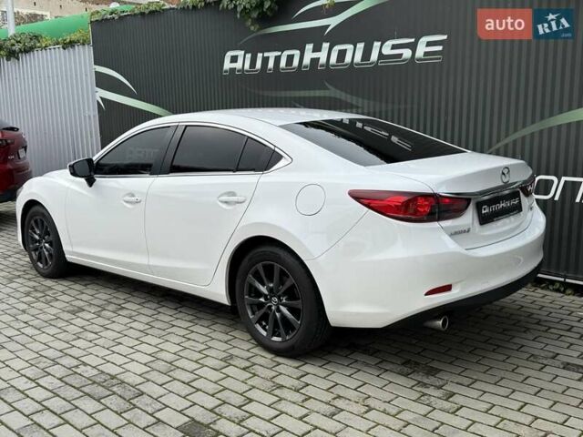 Білий Мазда 6, об'ємом двигуна 2 л та пробігом 145 тис. км за 12900 $, фото 22 на Automoto.ua