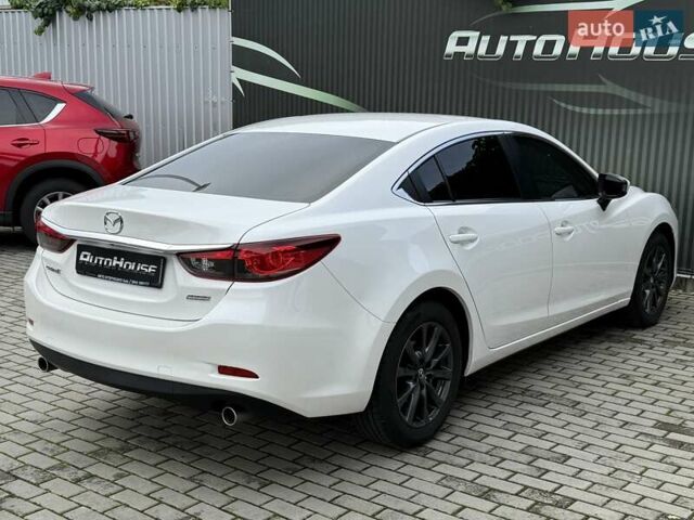 Білий Мазда 6, об'ємом двигуна 2 л та пробігом 145 тис. км за 12900 $, фото 26 на Automoto.ua