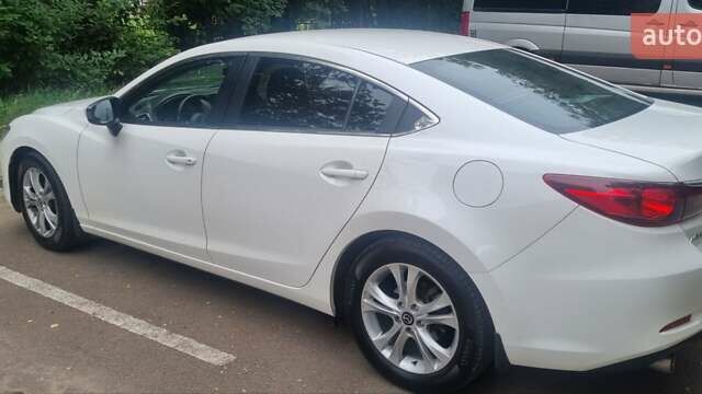 Білий Мазда 6, об'ємом двигуна 2 л та пробігом 112 тис. км за 12300 $, фото 4 на Automoto.ua
