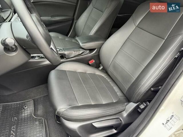 Білий Мазда 6, об'ємом двигуна 2 л та пробігом 145 тис. км за 12900 $, фото 58 на Automoto.ua