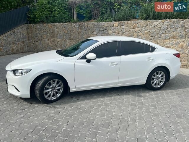 Білий Мазда 6, об'ємом двигуна 2 л та пробігом 135 тис. км за 12500 $, фото 4 на Automoto.ua