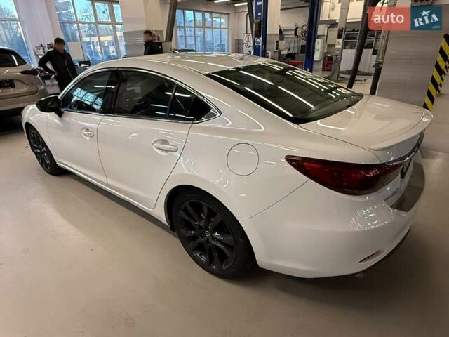 Білий Мазда 6, об'ємом двигуна 2.49 л та пробігом 231 тис. км за 14200 $, фото 3 на Automoto.ua