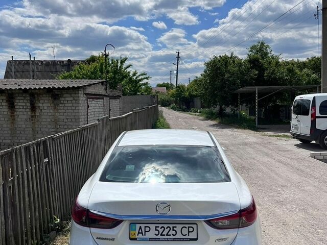 Білий Мазда 6, об'ємом двигуна 2 л та пробігом 121 тис. км за 11700 $, фото 7 на Automoto.ua