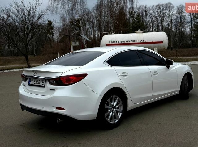 Білий Мазда 6, об'ємом двигуна 2.49 л та пробігом 209 тис. км за 11800 $, фото 4 на Automoto.ua