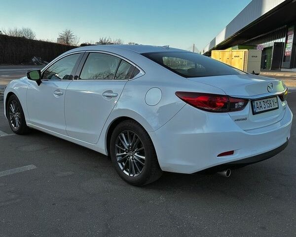 Белый Мазда 6, объемом двигателя 2.49 л и пробегом 175 тыс. км за 12700 $, фото 1 на Automoto.ua