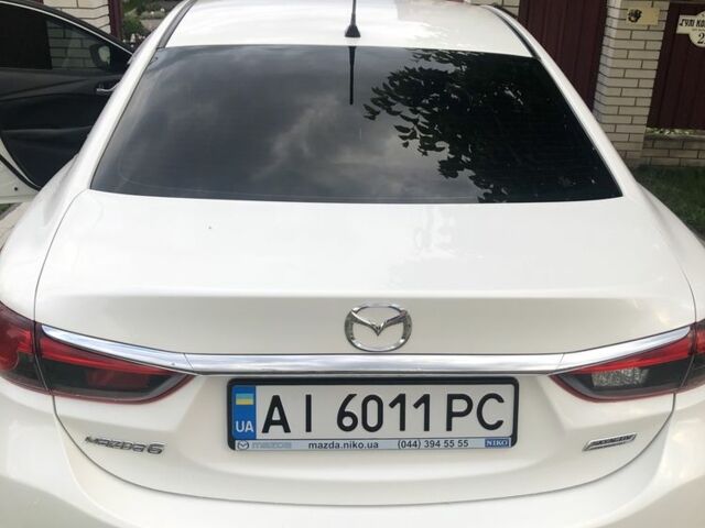 Білий Мазда 6, об'ємом двигуна 2 л та пробігом 135 тис. км за 12895 $, фото 5 на Automoto.ua