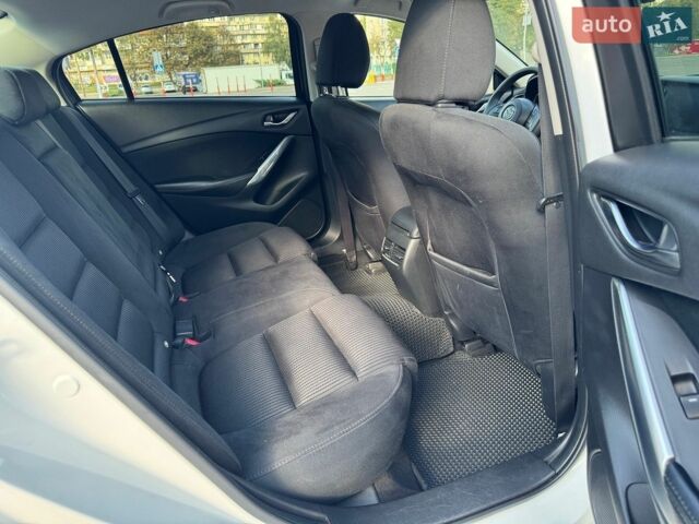 Білий Мазда 6, об'ємом двигуна 2 л та пробігом 209 тис. км за 12450 $, фото 7 на Automoto.ua