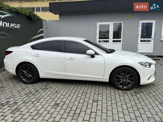 Білий Мазда 6, об'ємом двигуна 2 л та пробігом 145 тис. км за 12900 $, фото 19 на Automoto.ua
