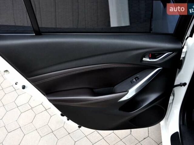 Білий Мазда 6, об'ємом двигуна 2.19 л та пробігом 117 тис. км за 11999 $, фото 19 на Automoto.ua