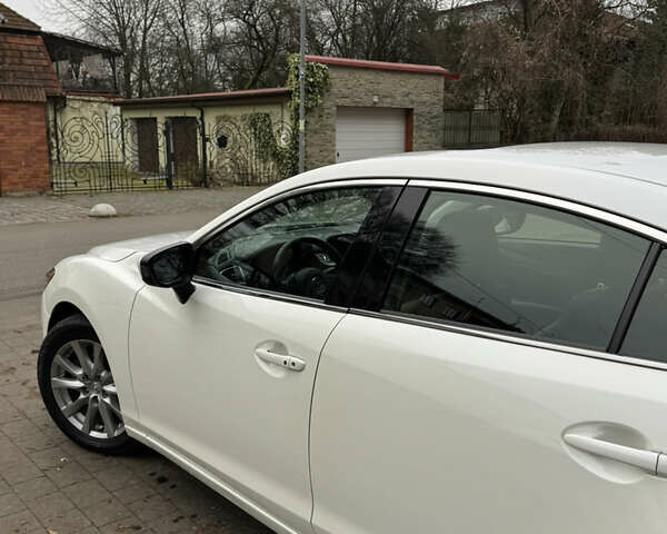 Білий Мазда 6, об'ємом двигуна 2.49 л та пробігом 200 тис. км за 11800 $, фото 9 на Automoto.ua
