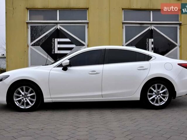 Білий Мазда 6, об'ємом двигуна 2.19 л та пробігом 117 тис. км за 11999 $, фото 13 на Automoto.ua