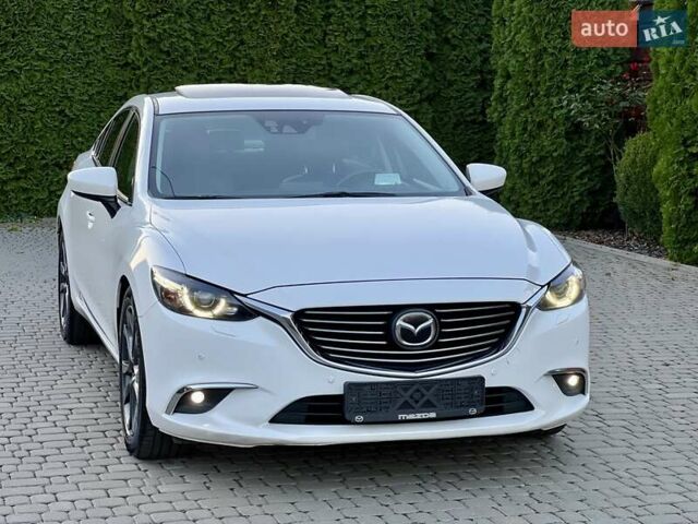 Белый Мазда 6, объемом двигателя 2.49 л и пробегом 130 тыс. км за 15997 $, фото 1 на Automoto.ua