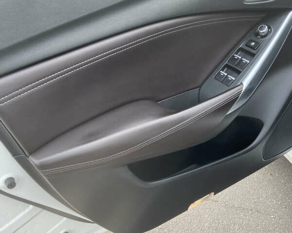 Білий Мазда 6, об'ємом двигуна 2.19 л та пробігом 143 тис. км за 12900 $, фото 21 на Automoto.ua