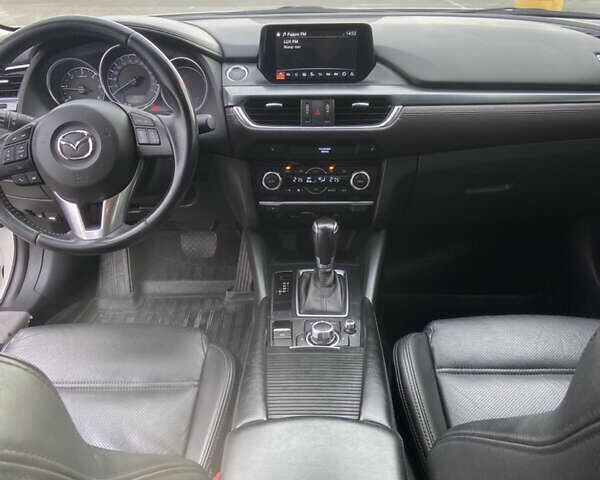 Білий Мазда 6, об'ємом двигуна 2.19 л та пробігом 143 тис. км за 12900 $, фото 17 на Automoto.ua