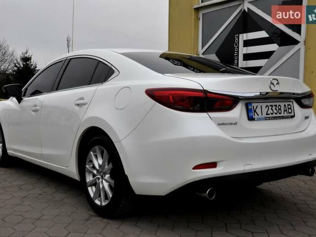 Білий Мазда 6, об'ємом двигуна 2.19 л та пробігом 117 тис. км за 11999 $, фото 12 на Automoto.ua