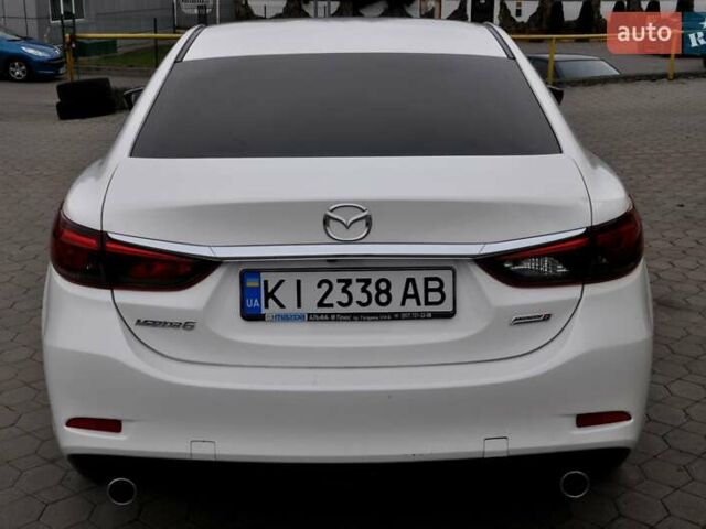 Білий Мазда 6, об'ємом двигуна 2.19 л та пробігом 117 тис. км за 11999 $, фото 9 на Automoto.ua