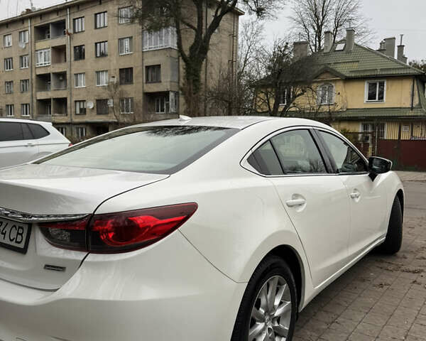 Білий Мазда 6, об'ємом двигуна 2.49 л та пробігом 200 тис. км за 11800 $, фото 6 на Automoto.ua