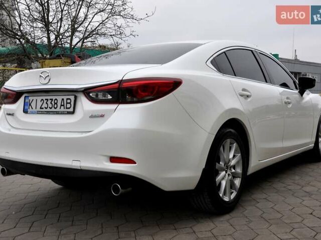 Білий Мазда 6, об'ємом двигуна 2.19 л та пробігом 117 тис. км за 11999 $, фото 8 на Automoto.ua
