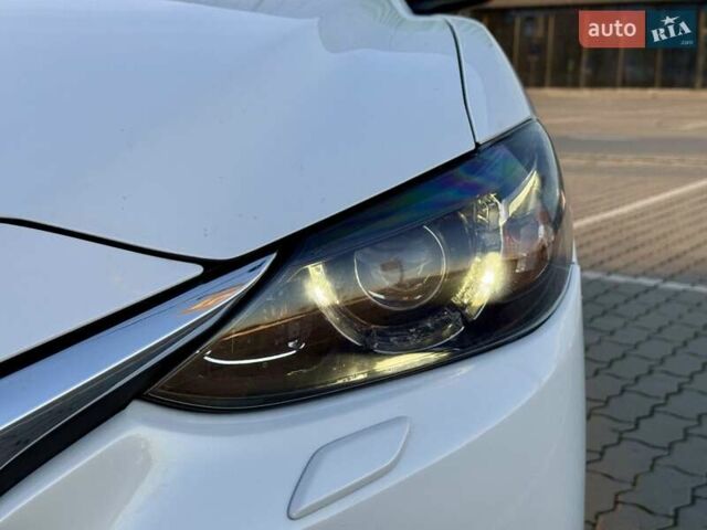 Білий Мазда 6, об'ємом двигуна 2.2 л та пробігом 117 тис. км за 12499 $, фото 33 на Automoto.ua