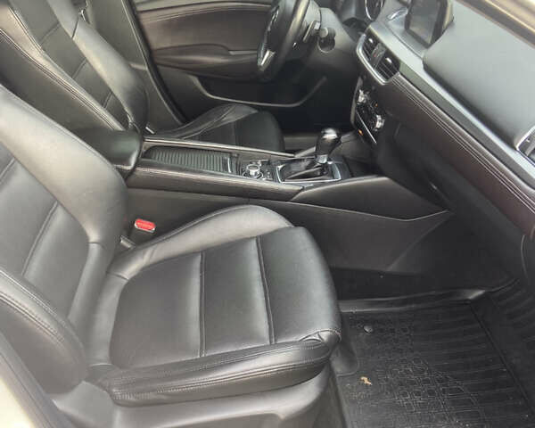 Білий Мазда 6, об'ємом двигуна 2.19 л та пробігом 143 тис. км за 12900 $, фото 24 на Automoto.ua