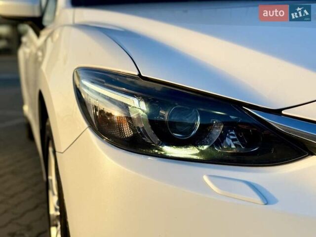 Білий Мазда 6, об'ємом двигуна 2.2 л та пробігом 117 тис. км за 12499 $, фото 31 на Automoto.ua