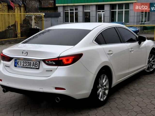 Білий Мазда 6, об'ємом двигуна 2.19 л та пробігом 117 тис. км за 11999 $, фото 40 на Automoto.ua