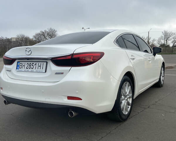 Білий Мазда 6, об'ємом двигуна 2.19 л та пробігом 143 тис. км за 12900 $, фото 5 на Automoto.ua