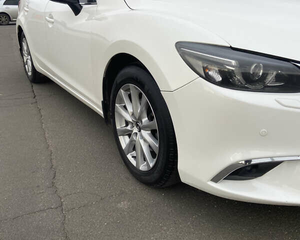 Білий Мазда 6, об'ємом двигуна 2.19 л та пробігом 143 тис. км за 12900 $, фото 10 на Automoto.ua