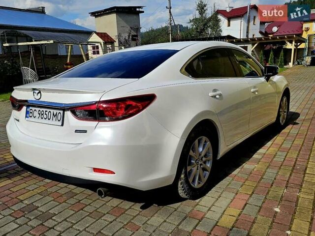Белый Мазда 6, объемом двигателя 2.49 л и пробегом 108 тыс. км за 12500 $, фото 1 на Automoto.ua