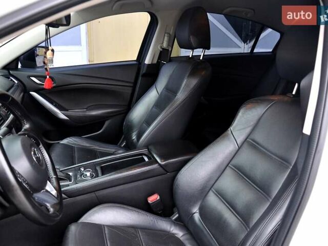 Білий Мазда 6, об'ємом двигуна 2.19 л та пробігом 117 тис. км за 11999 $, фото 18 на Automoto.ua