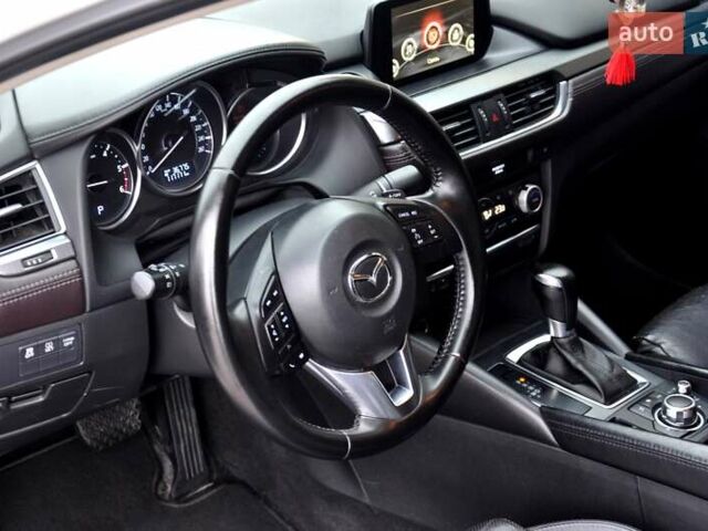 Білий Мазда 6, об'ємом двигуна 2.19 л та пробігом 117 тис. км за 11999 $, фото 17 на Automoto.ua