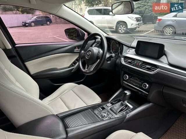 Білий Мазда 6, об'ємом двигуна 2.49 л та пробігом 142 тис. км за 13700 $, фото 9 на Automoto.ua