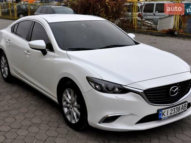 Білий Мазда 6, об'ємом двигуна 2.19 л та пробігом 117 тис. км за 11999 $, фото 5 на Automoto.ua