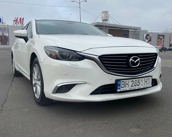 Білий Мазда 6, об'ємом двигуна 2.19 л та пробігом 143 тис. км за 12900 $, фото 3 на Automoto.ua