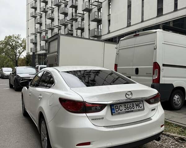Белый Мазда 6, объемом двигателя 2.49 л и пробегом 244 тыс. км за 13300 $, фото 10 на Automoto.ua