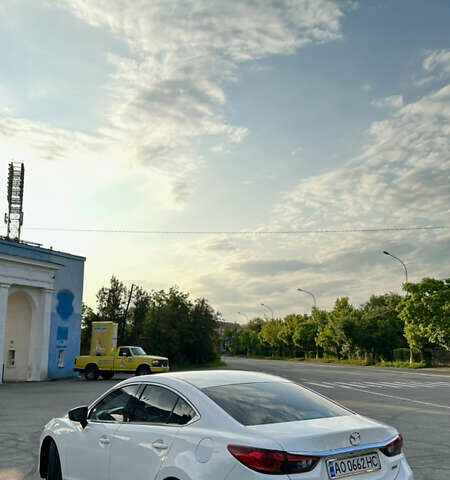 Белый Мазда 6, объемом двигателя 2.49 л и пробегом 248 тыс. км за 11300 $, фото 1 на Automoto.ua